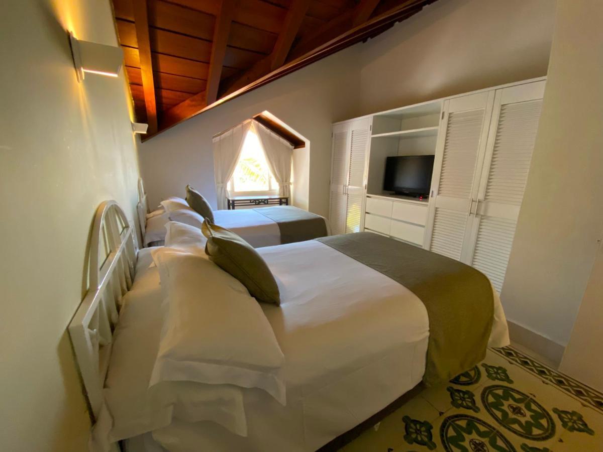 Hotel Las Americas Casa De Playa Cartagena 외부 사진 A room at the hotel